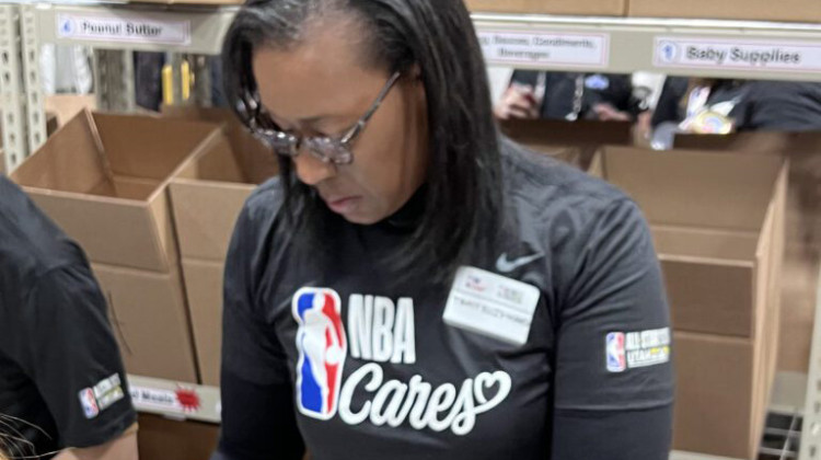 Tracy Ellis-Ward, Pacers Sports & Entertainment SVP of Diversity & Inclusion helps pack meals at the All-Star Game in Salt Lake City, Utah. - Photo courtesy of Corey Wilson