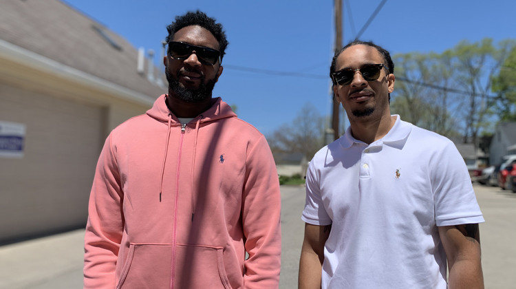 Marckus Williams (left) and Michael McFarland grew up in Indianapolis and have lived in the Arlington Woods area for years. They will be the owners of a new grocery store in the neighborhood, which is designated as a food desert. - Farah Yousry/Side Effects Public Media