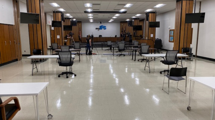 The layout of the Indianapolis Board of School Commissioners' board room just before the action meeting began on Thursday, March 19, 2020. Tables and chairs for district staff and media are spaced at least six-feet apart in following CDC guidelines to prevent the spread of the coronavirus. - Brad McQueen for WFYI