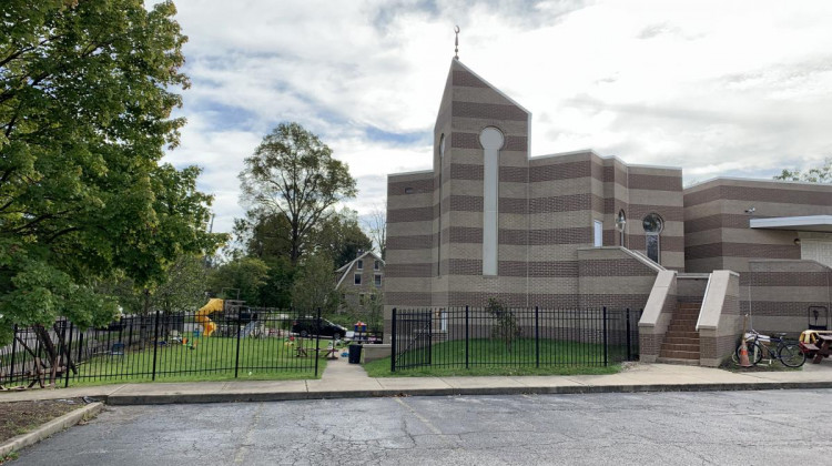 Security cameras at the Islamic Center of Bloomington caught a man damaging picnic tables, dumping trash cans, and breaking metal fencing. - Devan Ridgway/WFIU-WTIU News