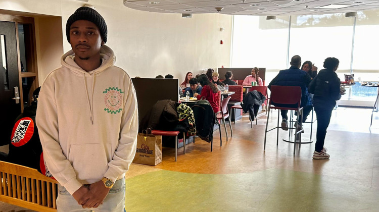 Darrius Avery, an IU Indianapolis senior, stands in Taylor Hall during a "eat-in" on Sunday, Jan. 18, 2026 to protest the university's cancellation of the annual Martin Luther King, Jr. dinner. - Zak Cassel / WFYI