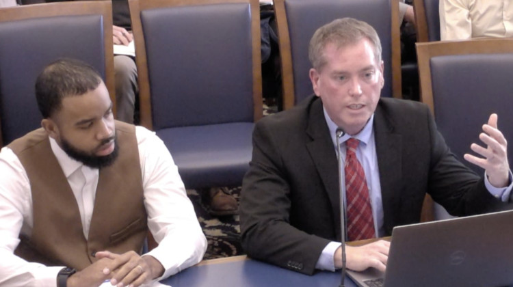 Indiana Housing and Community Development Authority Director Jacob Sipe, right, speaks to the Indiana Housing Task Force at its first meeting on Sept. 29, 2022. Derris Ross, who represents the Hoosier Housing Needs Coalition on the task force, sits beside him. - Screenshot Of Iga.In.Gov