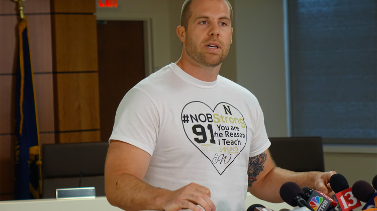 Seventh grade teacher Jason Seaman, who is credited with tackling the shooter at Noblesville West Middle School, speaks at a press conference Monday. (Eric Weddle/WFYI News)