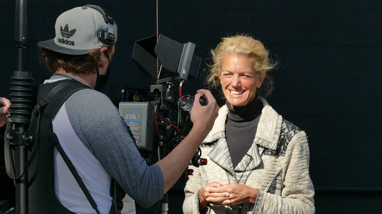 Jill Ditmire records on location during production of "Celebrate Naptown." - Clayton Taylor/WFYI