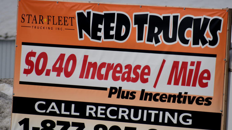 A sign from a trucking company in Nappanee, Indiana, recruits truckers. In some industries, like trucking, worker shortages were exacerbated by the pandemic. - Justin Hicks/IPB News