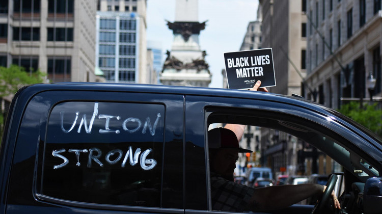 Union workers at a car rally outside the Indiana Statehouse last summer. - Justin Hicks/IPB News