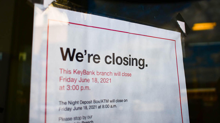 A sign on the front of a former KeyBank branch in South Bend warns customers that it will be closing.  - Justin Hicks/IPB News