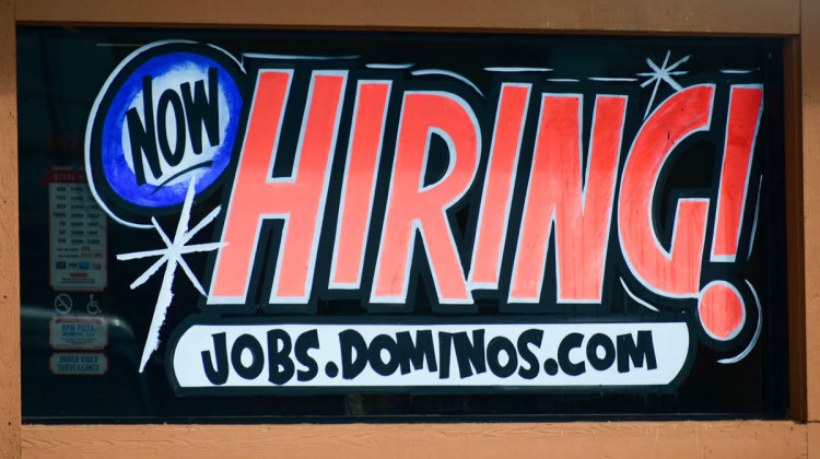 A hiring sign on a Domino's pizza location in South Bend.  - Justin Hicks/IPB News