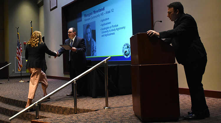 Reagan Rowland, a student at Warsaw Community High School, accepts an award at the Career and Technical Education Awards for Excellence ceremony. - Justin Hicks/IPB News