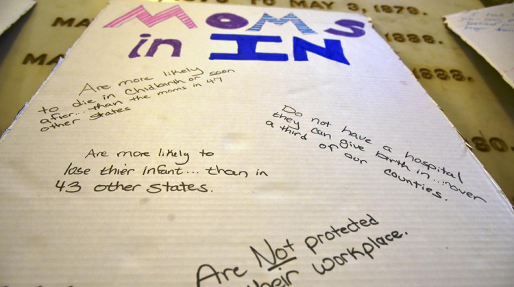 A poster advocating for better policies for women from a Hoosier Action statehouse rally during the 2021 legislative session. - Justin Hicks/IPB News