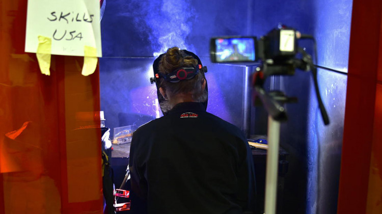 A student at the Elkhart Area Career Center welds a design for the SkillsUSA competition while being recorded on camera.  - Justin Hicks/IPB News