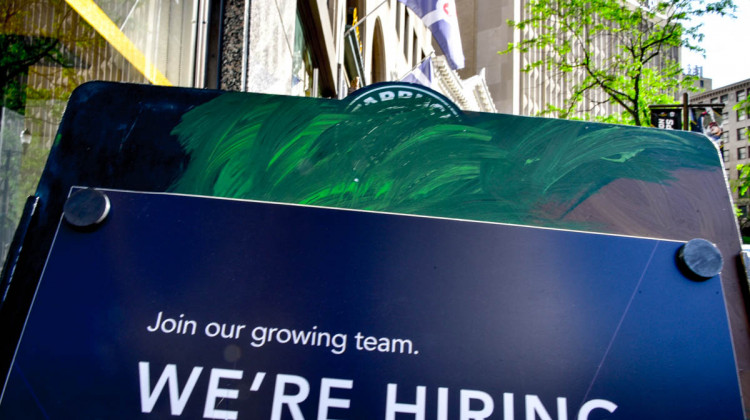 A Starbucks in Indianapolis' Monument Circle advertises a job. - Justin Hicks/IPB News