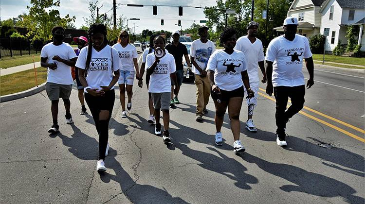 In June, some of Eric Logan's family and close friends marked the one year anniversary of his death with memorial service and marched to demand justice. - FILE PHOTO: Justin Hicks/IPB News