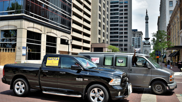 Workers honked their vehicle horns and displayed signs with messages including "Support our Heroes" and "Black Lives Matter" outside the Statehouse. - Justin Hicks/IPB News