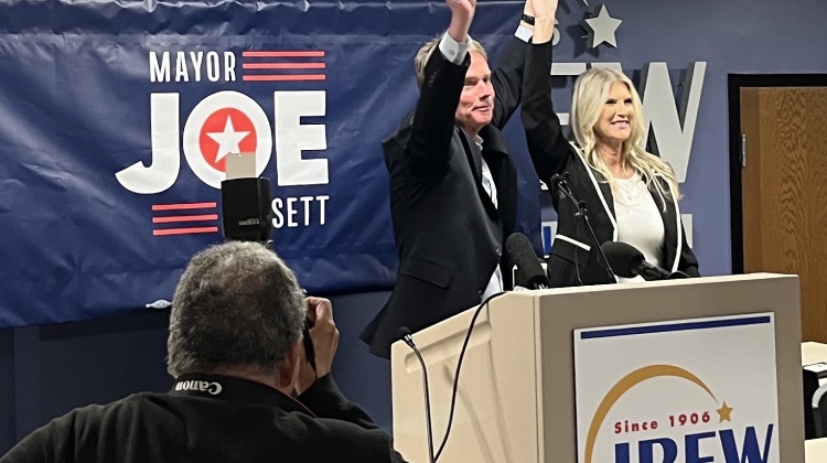 Stephanie Hogsett stands by her husband after winning the primary race in May 2023. (Jill Sheridan/WFYI)