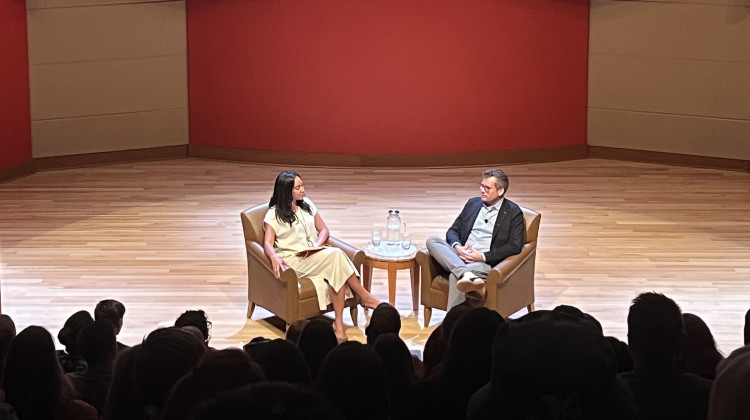 Young adult author John Green spoke to State Sen. Andrea Hunley (D-Indianapolis) at the Indianapolis Central Library as part of an event kicking off national Banned Books Week on Monday, Oct. 2, 2023. - Lee V. Gaines / WFYI