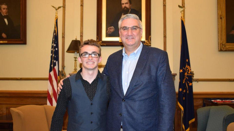 Joshua Christian and Gov. Eric Holcomb.  - Photo provided by Connected by 25
