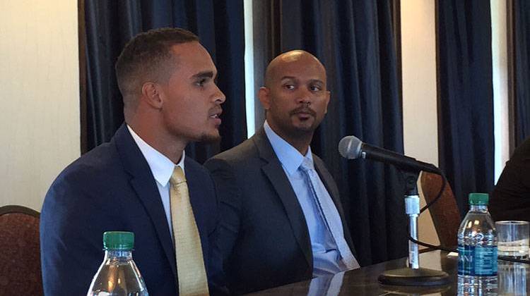 Kain Colter speaking to the Indiana AFL-CIO state convention while Ramogi Huma looks on.   - Brandon Smith