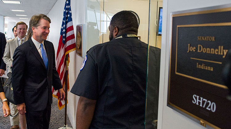 Supreme Court nominee Brett Kavanaugh walks to the office of Sen. Joe Donnelly, D-Ind., for a meeting on Capitol Hill in Washington, Wednesday, Aug. 15, 2018. - AP Photo/Cliff Owen