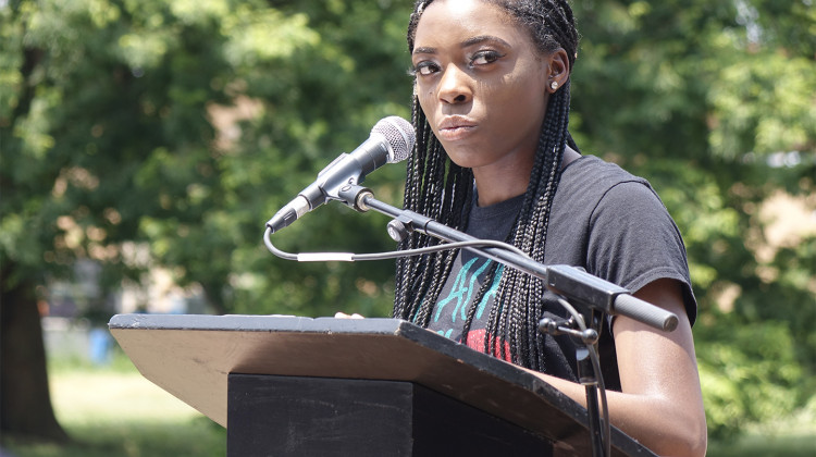 Kayla Pitts, a Cathedral high school senior, speaks at a Juneteenth celebration at Dr. Martin Luther King Jr. Park on Friday, June 19, 2020. - Eric Weddle/WFYI News