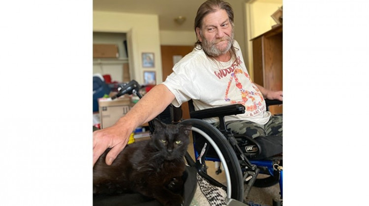 Indy resident Alan Hall and his cat Princess. CICOA Aging and In-Home Solutions launched a program last month offering pet food and supplies to low-income, homebound seniors.