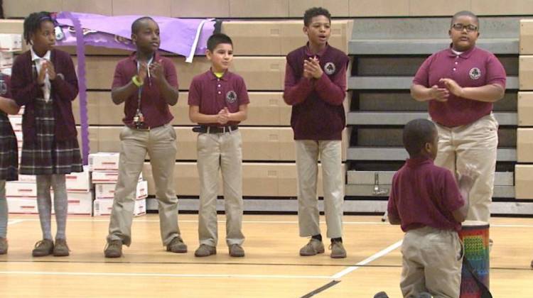 Students at Tindley Genesis Academy in Indianapolis participate in the morning meeting, which blends songs, chants and dancing. Music is at the center of all curriculum at the school. - Steve Burns/WTIU