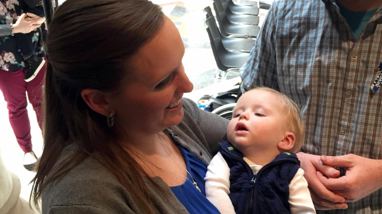 Andrea Clausen holds her son Bryce at the Statehouse.  - (Jill Sheridan/IPB News)