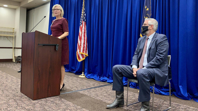 In this photo taken Aug. 18, 2021, State Health Commissioner Dr. Kris Box, left, and Gov. Eric Holcomb announce the creation of the Indiana Public Health Commission. - Brandon Smith/IPB News