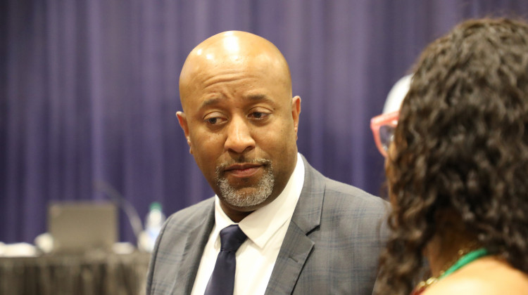 Interim superintendent Larry Young speaks to a parent at Lincoln Middle School on Thursday, June 9, 2022. Young’s entire 24-year career in education is at Pike Township Schools. - Eric Weddle/WFYI