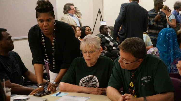 Dylan Peers McCo/Chalkbeat Indiana - Lee Boler, left, who served as IPS chief strategist, resigned from Indianapolis Public Schools.