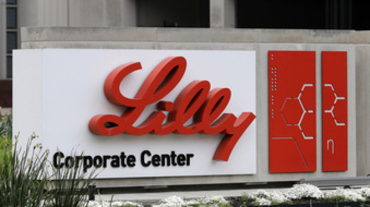 A sign for Eli Lilly & Co. sits outside their corporate headquarters in Indianapolis on April 26, 2017. New research shows another experimental Alzheimer's drug can modestly slow patients' inevitable worsening. Patients given monthly infusions of Eli Lilly and Co.'s donanemab declined about four to seven months more slowly than those given dummy infusions in a large study. - AP Photo/Darron Cummings