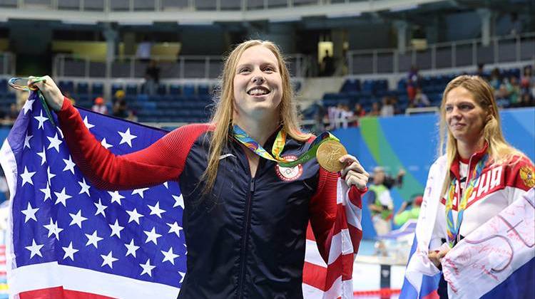 Winner United States' Lilly King and second placed Russia's Yulia Efimova, right, celebrate with their medals after the women's 100-meter breaststroke during the swimming competitions at the 2016 Summer Olympics, Tuesday, Aug. 9, 2016, in Rio de Janeiro, Brazil. - AP Photo/Lee Jin-man