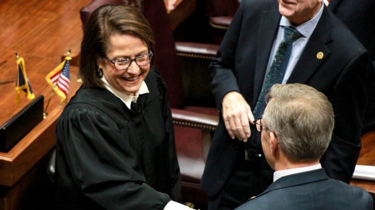 Indiana Supreme Court Chief Justice Loretta Rush greets lawmakers as she enters the House Chamber for her annual State of the Judiciary address on Jan. 10, 2024. - Brandon Smith/IPB News