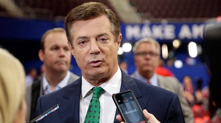 Trump Campaign Chairman Paul Manafort talks to reporters on the floor of the Republican National Convention at Quicken Loans Arena, Sunday, July 17, 2016, in Cleveland.  - AP Photo/Matt Rourke
