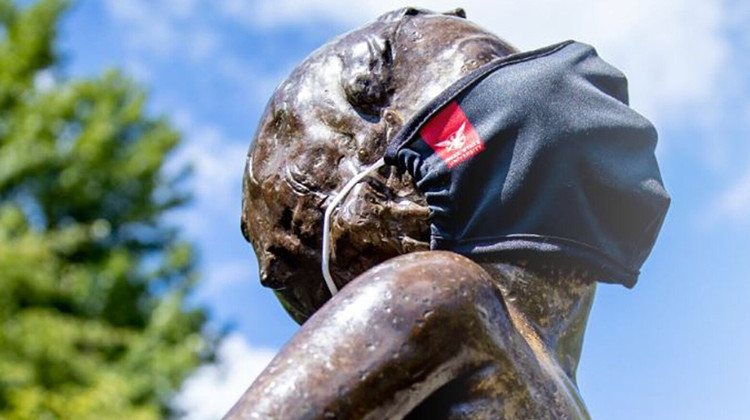 Ball State's "Frog Baby" statue wears a face mask. - Provided by Ball State University