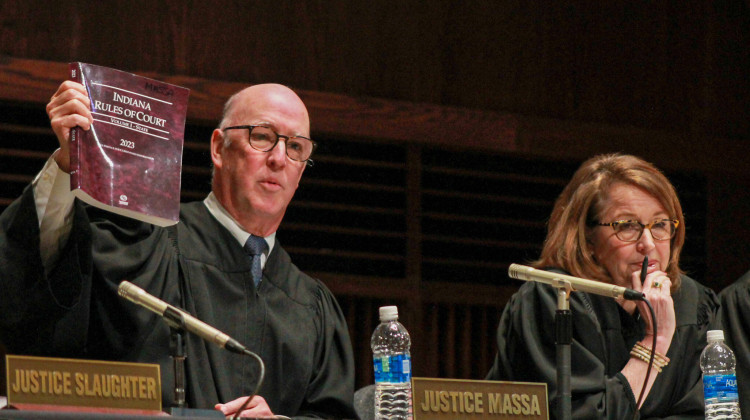 Indiana Supreme Court Justice Mark Massa speaks to students during a Q&A at the University of Indianapolis on Tuesday, April 11, 2023. Chief Justice Loretta Rush sits beside him. - Brandon Smith/IPB News