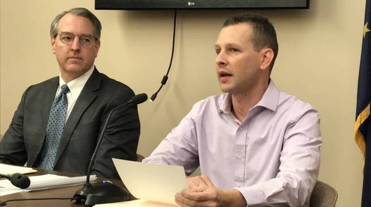 Rep. Matt Pierce (D-Bloomington) looks on as Brownsburg resident Corey Polen, who suffers from ALS, discusses Pierceâ€™s assisted suicide bill. - Brandon Smith/IPB News