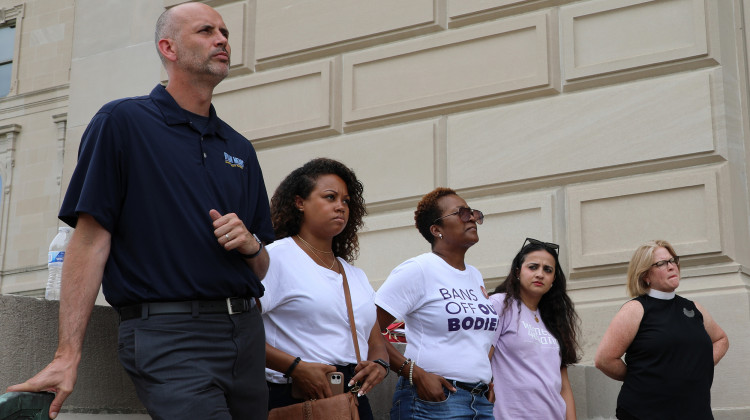 Marion County Prosecutor Ryan Mears, left, stands next to speakers and organizers of an abortion rights rally organized by the ACLU of Indiana at the Indiana capital on Saturday, June 25, 2022. - Eric Weddle/WFYI