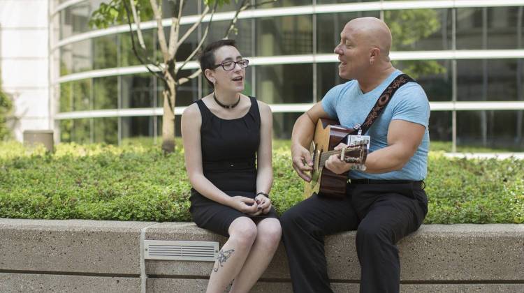 Music Therapist Tony Madieros sings with a patient at IU Health. - Courtesy of IU Health