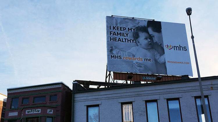 An Indianapolis billboard for MHS, one of the only insurers offering coverage on healthcare.gov in Indiana. - Sarah Fentem/Side Effects Public Media