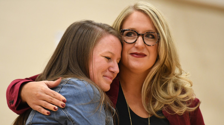 Indiana Secretary of Education Katie Jenner hugs teacher Angela Fowler after Fowler was named a Milken Educator Award recipient at Grassy Creek Elementary School in Greenwood on Tuesday, Nov. 22, 2022.  - Courtesy Milken Family Foundation