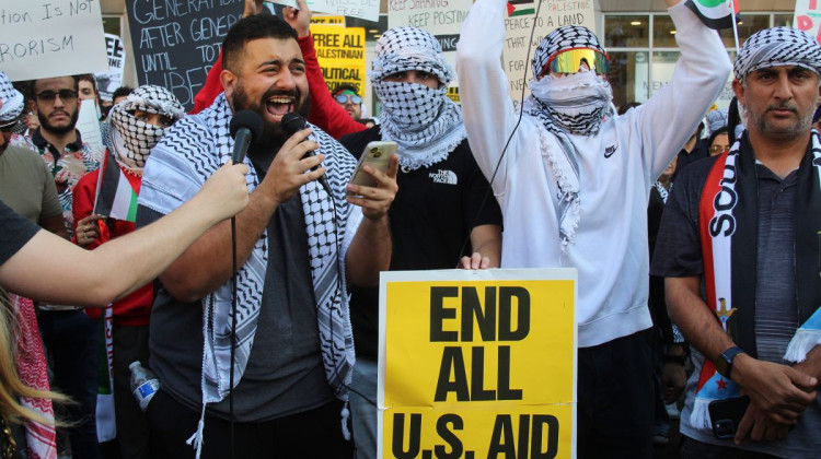 Fishers resident Mohammad Abu Hummos speaks at rally in solidarity with Palestine on Thursday, Oct. 12, 2023 in downtown Indianapolis. (Ben Throp/WFYI)