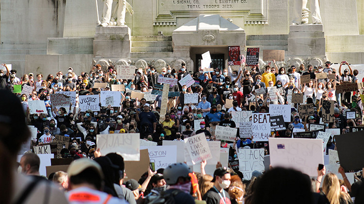 Protesters gathered on Monument Circle in Indianapolis in June 2020. Many of the protests in Indianapolis that summer focused on the death of Dreasjon Reed, who was shot and killed by an Indianapolis police officer as he ran from police following a car chase on May 6. - Lauren Chapman/WFYI
