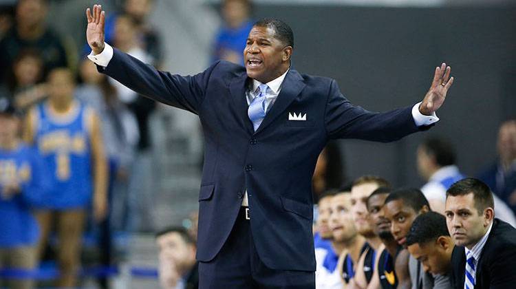 Morehead State head coach Sean Woods talks to his team against UCLA during an NCAA college basketball game, Friday, Nov. 22, 2013, in Los Angeles. - AP Photo/Danny Moloshok