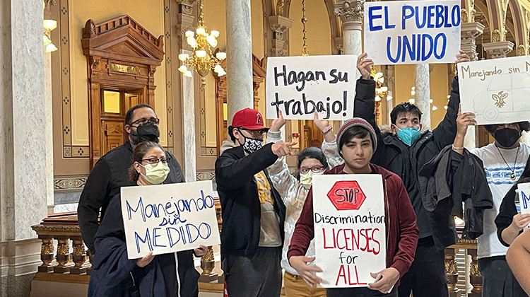 Members of immigrant rights activist group Movimiento Cosecha demonstrated at the Statehouse on Wednesday. - Sydney Dauphinais/WFYI