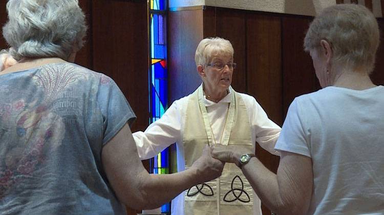 Bishop Nancy Meyer presides over mass at the Indiana Interchurch Center. - Barbara Brosher/WFIU-WTIU