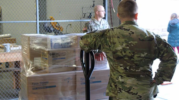 Members of Indiana's National Guard distribute supplies from the Strategic National Stockpile for hospitals across the state in April. The Guard is now working with the Secretary of State to distribute PPE to polling places. - Lauren Chapman/IPB News