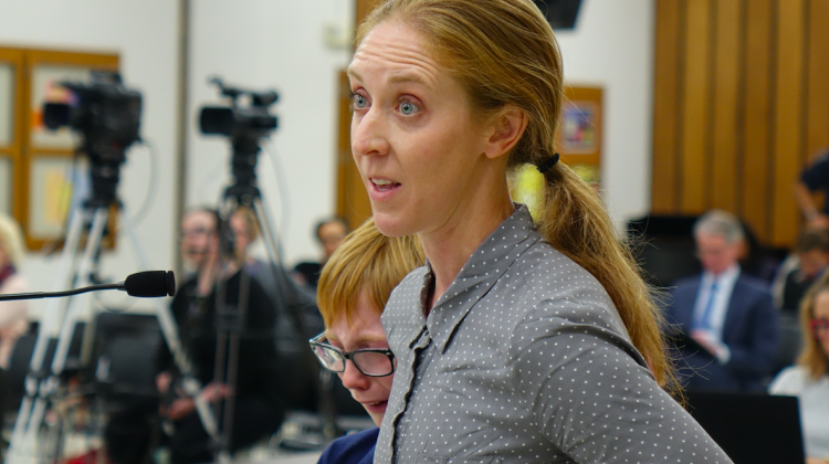 Nicole Goodson and her fifth-grade son Spencer choked back tears as they talk to the IPS School Board on Thursday, Oct. 26, 2017. - Eric Weddle/WFYI Public Media