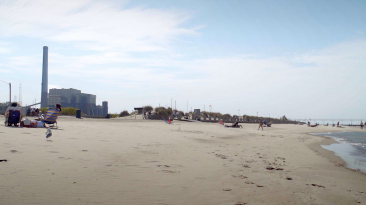 Kids play at the beach at Washington Park not too far from the NIPSCO coal plant.  - Alan Mbathi/IPB News