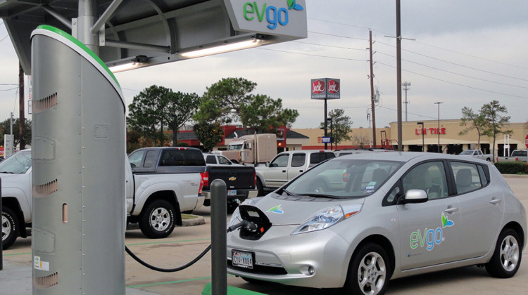 A Nissan Leaf charges up at an electric vehicle charging station. EV owners pay an annual registration fee of $214 in Indiana, for hybrids it's $72.  - EVgo Network/Wikimedia Commons